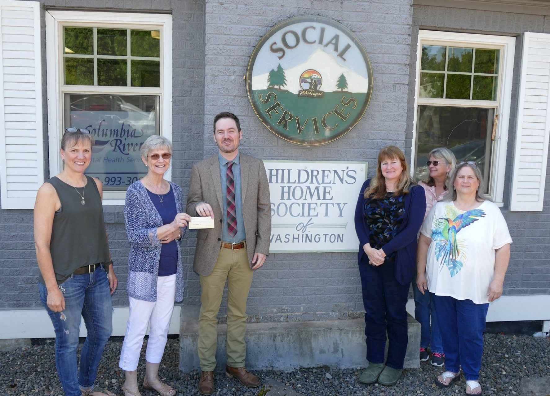 Treasurer Marianne distributing 2013 grant to Lower Columbia Estuary Partnership